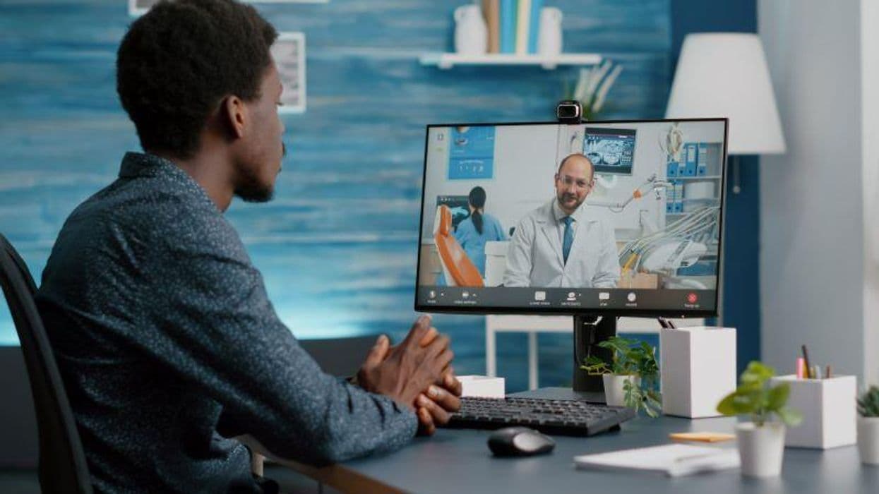 Can AI Tool Improve Quality of Patient-Submitted Images of Skin Disease?